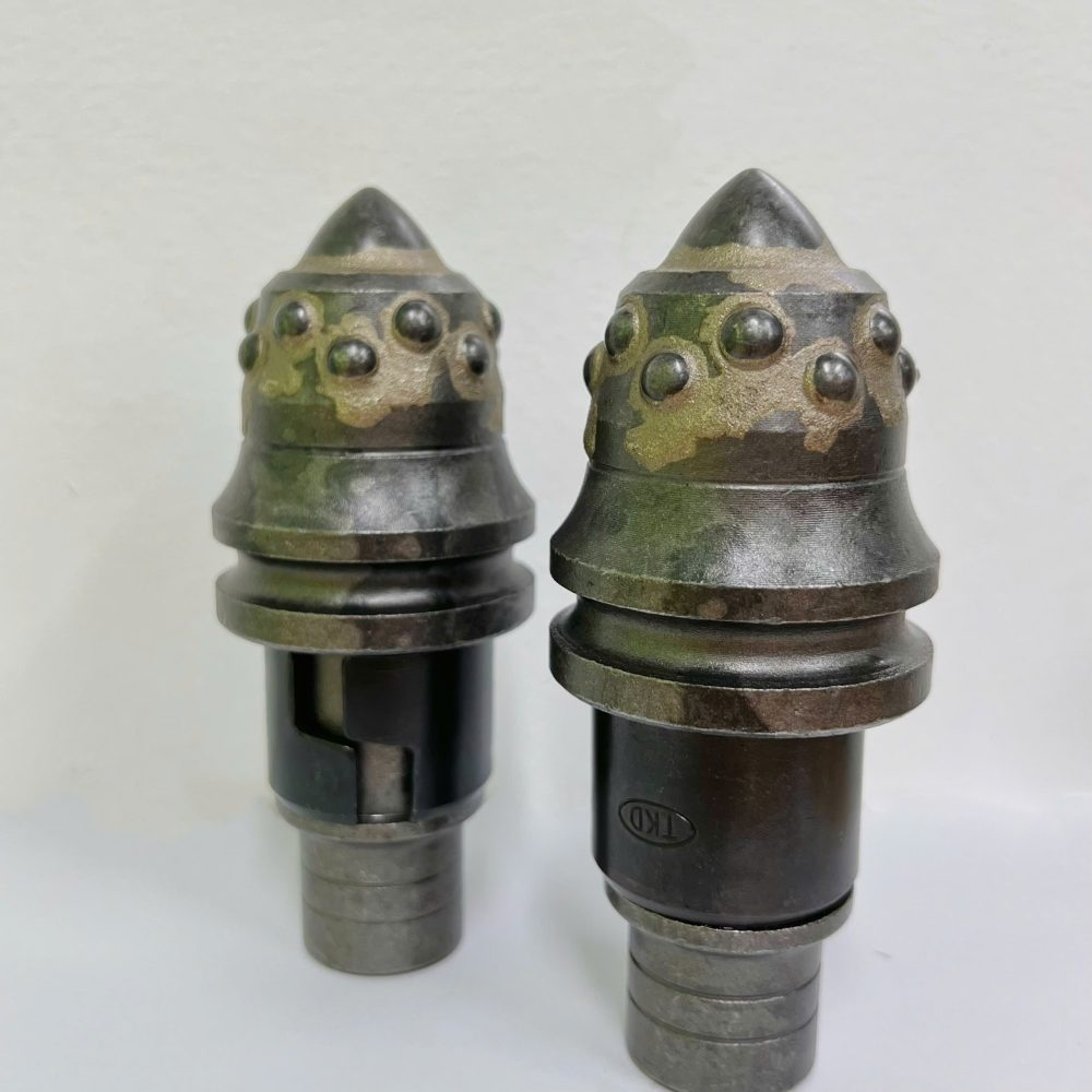 Răng khoan có bổ sung thêm hạt cắt